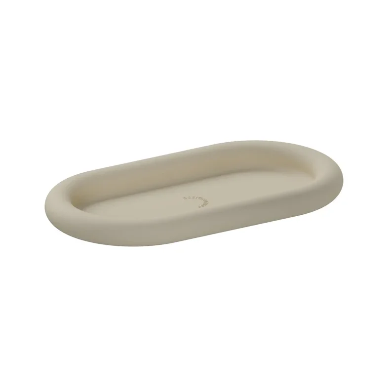 DESIGNSTUFF Bubble rund silikonebakke i sandfarve til opbevaring af s�beflasker.